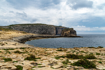 Fototapeta na wymiar Fungus Rock at Dwejra Bay., San Lawrenz, Gozo.