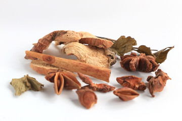 Spices and herbs on white background