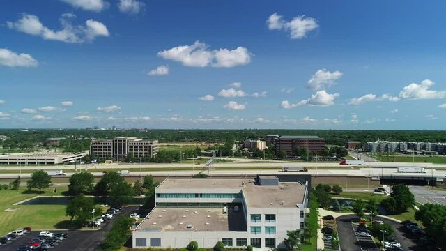 Aerial View of a Corporate Office Building and Its Parking Lot