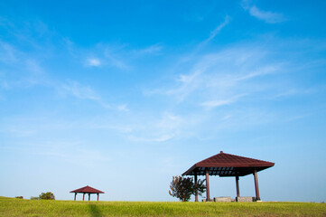 Pavilions against the blue sky.