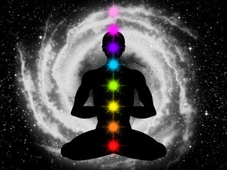 Silhouette of meditating human in space. Infinity space. Yoga man. Lotus asana. Chakras symbols.