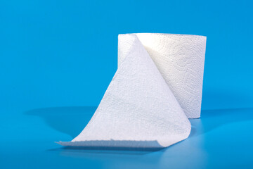 Toilet Paper. Roll Of Toilet Paper On Blue Background, One toilet paper roll isolated on blue background
