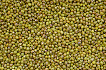 Background image of mung beans that have been roasted by heat.