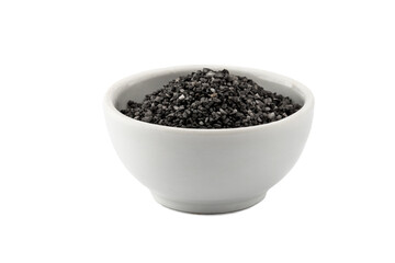 crystals of black food salt in a salt shaker, isolate on a white background