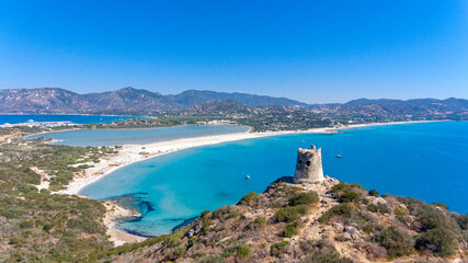 Fototapeta premium aerial view of Porto Giunco beach and tower in Villasimius