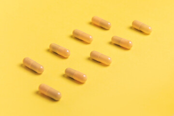 yellow pills and capsules