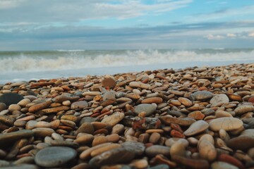 Fototapeta na wymiar pebble beach and rocks