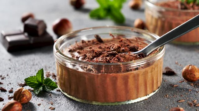 eating chocolate mousse