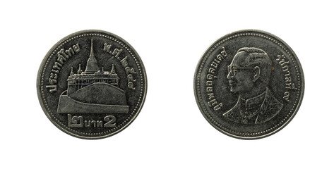 2 Baht coin from Thailand with Saket Temple in Bangkok and Rama IX on it.