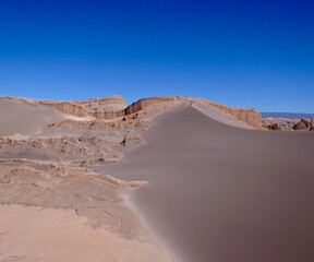 Fototapeta na wymiar Dark sand dune, Valley of the moon in Atacama salt desert, Chile