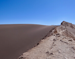 Dark sand dune, Valley of the moon in Atacama salt desert, Chile