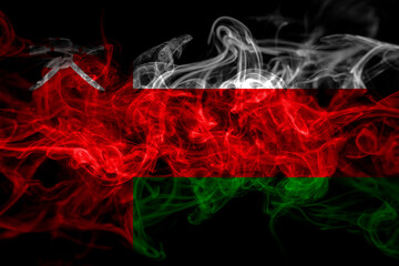Oman smoke flag isolated on black background