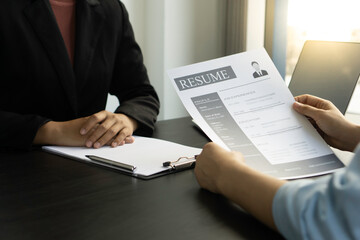 Job applicants are submitting a resume writing a resume and Talent of job applicants prepared to finance company managers, job interview ideas