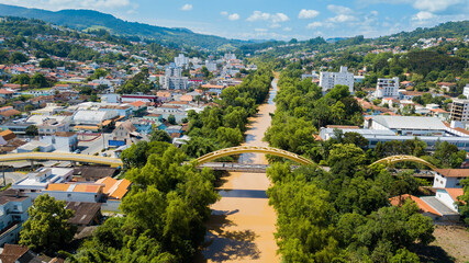 Rio do Sul - SC. Aerial view of the city and Itajaí river with its bridges