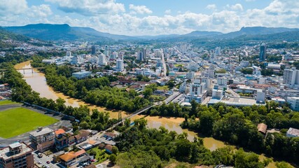 Rio do Sul - SC. Aerial view of the city and Itajaí river with its bridges