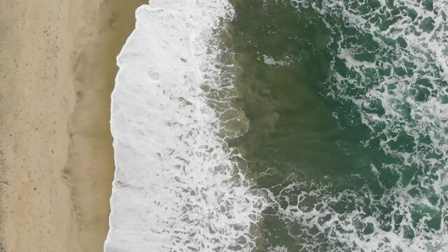 Drone footage of Beach waves coming onto shore of Tranquebar Tamil Nadu Chennai