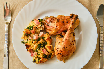 Chicken with stuffing on plate top view