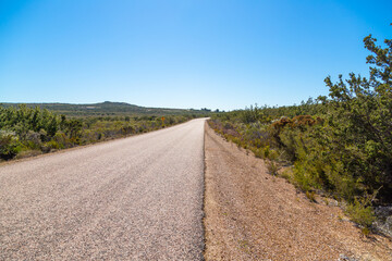 Fototapeta na wymiar Gravel Road in the Cape Le Grand Nationalpark close to Esperance in Western Australia