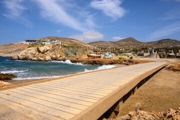 Koumbara beach located in a rocky bay on Ios Island. Cyclades, Greece