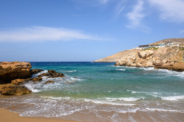 Fototapeta na wymiar Koumbara beach located in a rocky bay on Ios Island.Cyclades, Greece