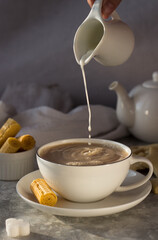 milk, milkman, tea, coffee, waffles, sweet, tea steam, pours, drops, splashes, cup, drink, breakfast, food, hot, white, beverage, cafe, spoon, brown, espresso, morning, table, caffeine, cream, bowl, s