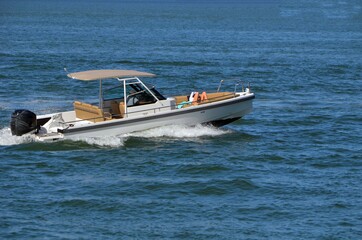 Fototapeta premium High-end motorboat cruising on Biscayne Bay near Miami Beach,Florida