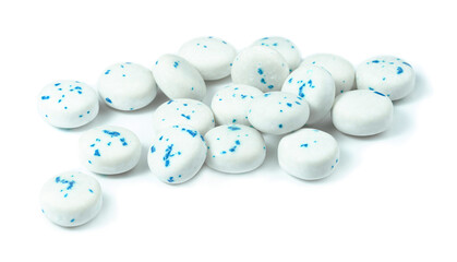 round chewing gum tablets on white background