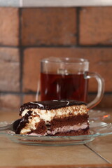 Layer cake with fruit and cream fillings decorated chocolate icing