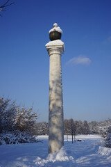 a snow cap on a column in the Kuskovo park. winter. Moscow