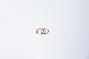 gold wedding rings isolated on a white background