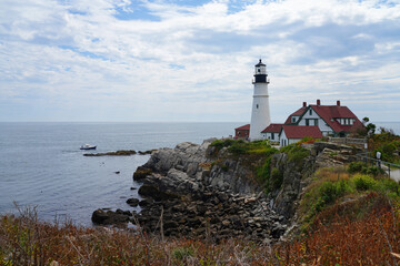 Fototapeta na wymiar CAPE ELIZABETH, ME -View of the Portland Head Light, an historic lighthouse located in Casco Bay in the Gulf of Maine, United States.