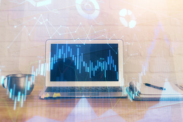 Forex market chart hologram and personal computer background. Multi exposure. Concept of investment.
