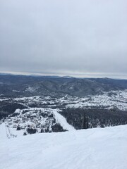 Obraz premium Holidays in the mountains, trail for skiers and snowboarders, cold winter