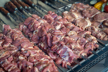 pork, lamb, beef, prepared for grilling on skewers