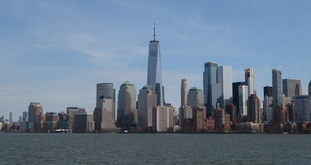 Skyline and modern office buildings of Midtown Manhattan viewed from across the Hudson River. 