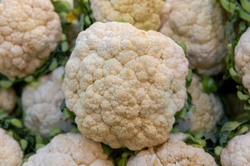 close-up cauliflower background. fresh vegetables standing on the counter in the market place
