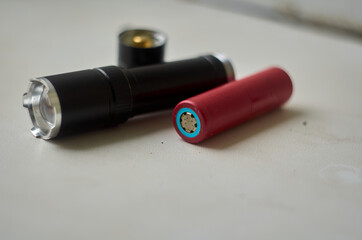 Photo of disassembled pocket flashlight