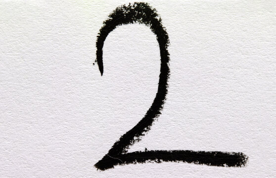 number two made of black and white crayon