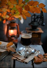 Autumn leaves, Coffee Grinder and cup of black coffee. Background for website, bloggers, social media. 