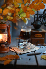 Autumn leaves, Coffee Grinder and cup of black coffee. Background for website, bloggers, social media. 