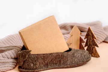 christmas decoration.box with a gift in a boot