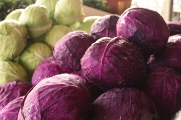 Fototapeta na wymiar Up-close image of purple cabbages at a Farmer's Market
