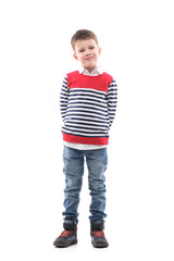 Cute stylish charming cool little boy in sweater posing with hands behind back. Full body portrait isolated on white background.  © sharplaninac