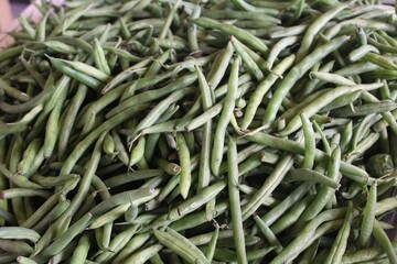 Fototapeta premium Up-close image of green beans at a Farmer's Market