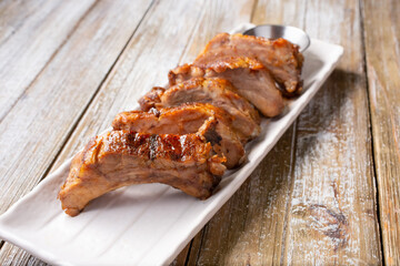 A view of an appetizer plate of BBQ pork ribs.