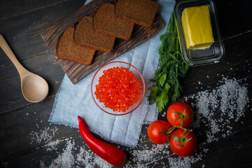 Chum salmon caviar in a glass bowl . Seafood, delicacies, healthy nutrition. 