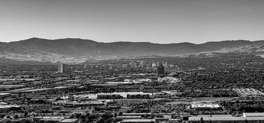 Panoramic Cityscape of Reno and Sparks Nevada as seen from the East during winter in monochrome.