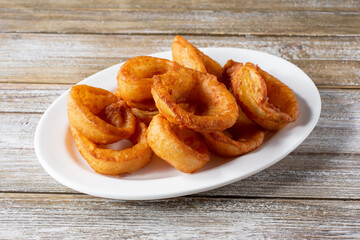 A view of a plate of onion rings.