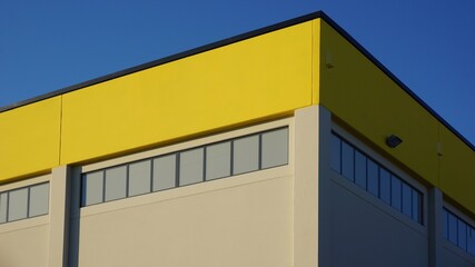 industrial building facade yellow painted