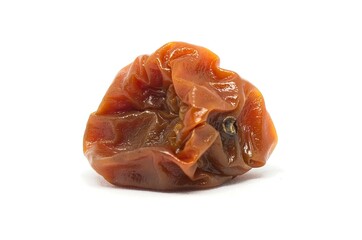 Rotten red cherry tomato on whote background with soft defocus. Studio shot of a vegetable